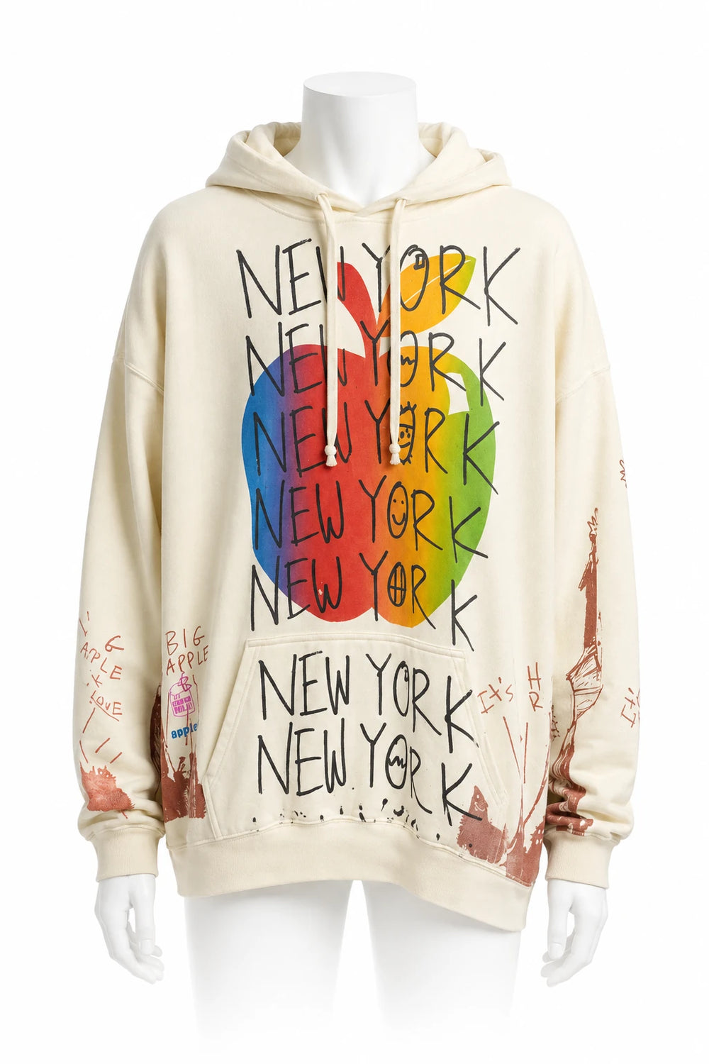 Cremefarbener Oversized-Hoodie mit farbigem Apfel- und New-York-Motiv auf weißer Schaufensterpuppe · Vorderansicht